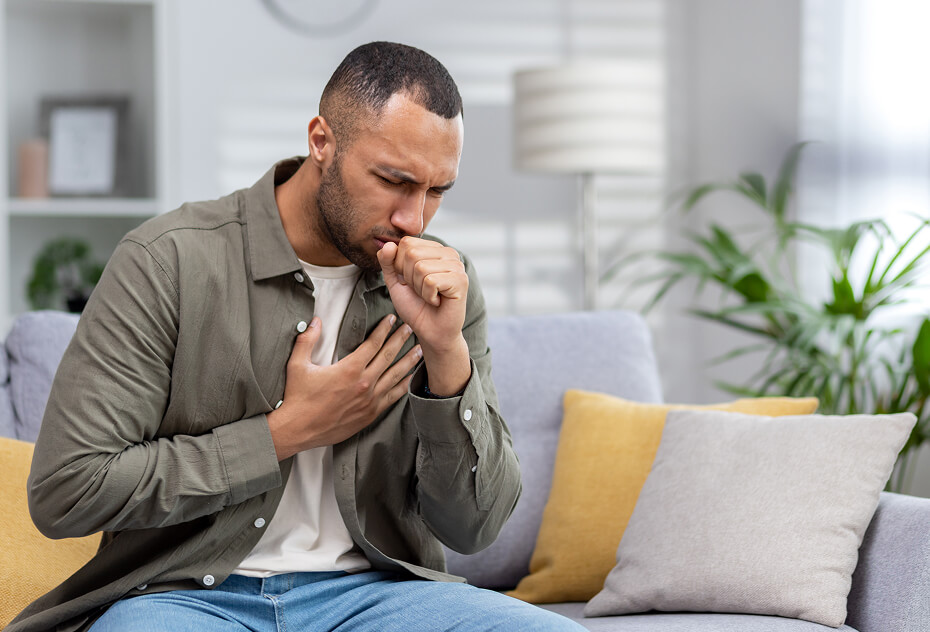 young-african-american-man-sitting-on-the-couch-at-2023-11-27-05-34-01-utc