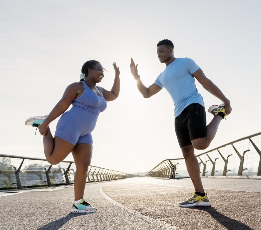 smiling-african-american-woman-and-man-giving-high-2023-11-27-05-29-00-utc-1